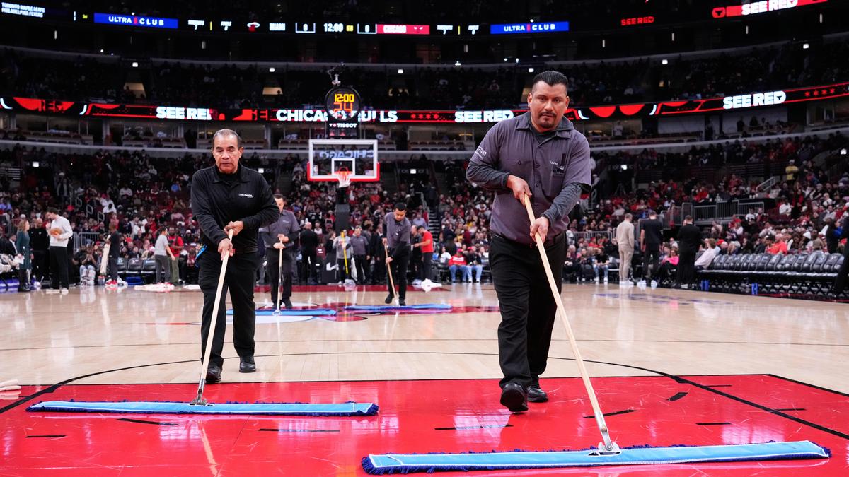 Why was the Heat vs Bulls NBA game postponed at the United Center?